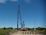 Boom Crane driving pilings